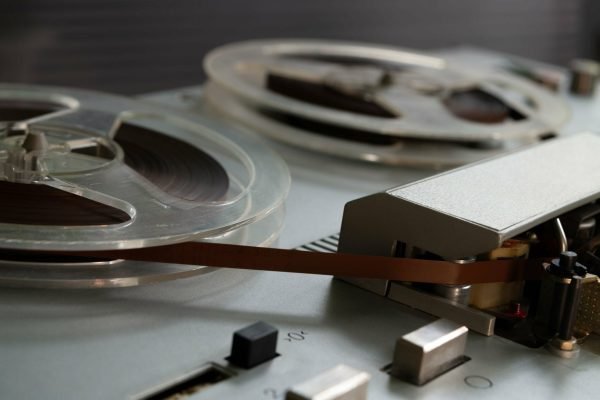 Old vintage reel-to-reel player. Tape recorder with spools. Bobbin tape recorder